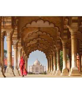 Woman in traditional Sari walking towards Taj Mahal - Pangea Images